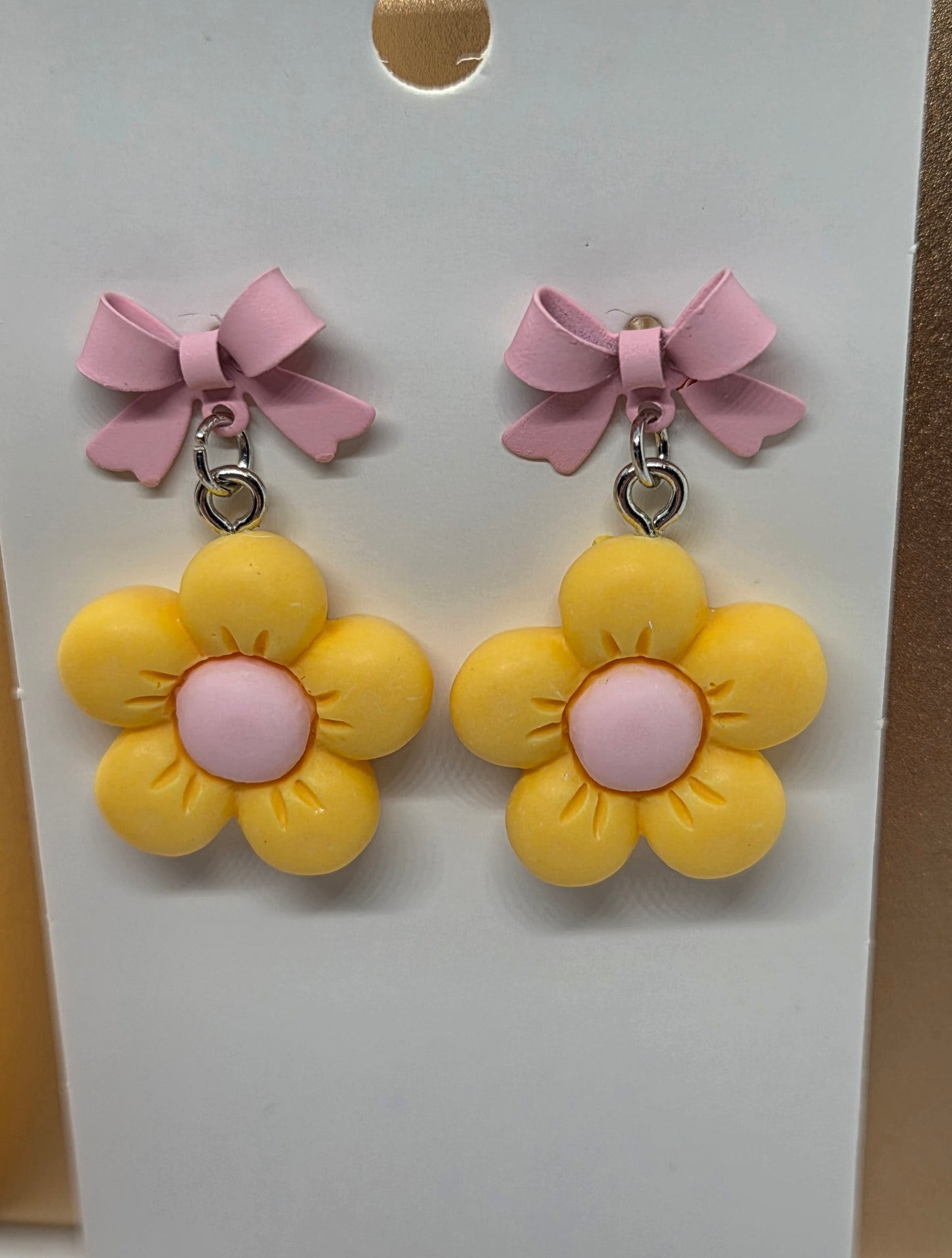 Yellow Flowers W/ Pink Bows